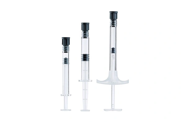 Close up of high precision integrated needle for COP prefilled syringes